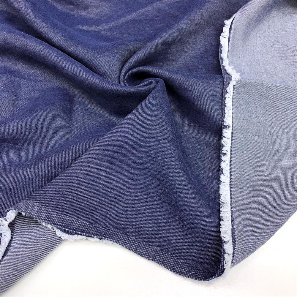 Taşlanmış İnce Tensel Kot Kumaş Koyu Mavi Taşlanmış İnce Tensel Kot Kumaş Koyu Mavi